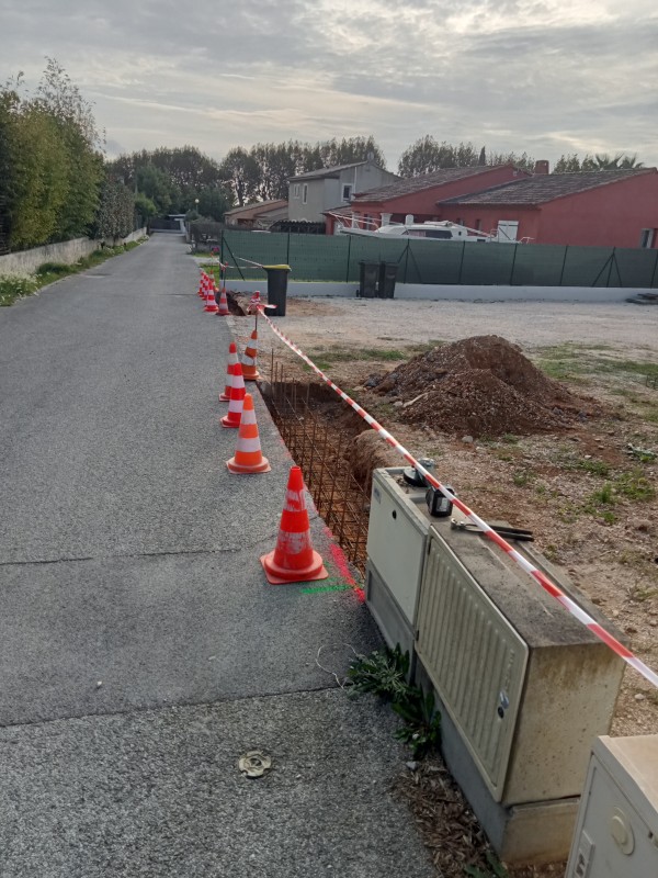 Création d'un mur de clôture et pose d'un portail 
