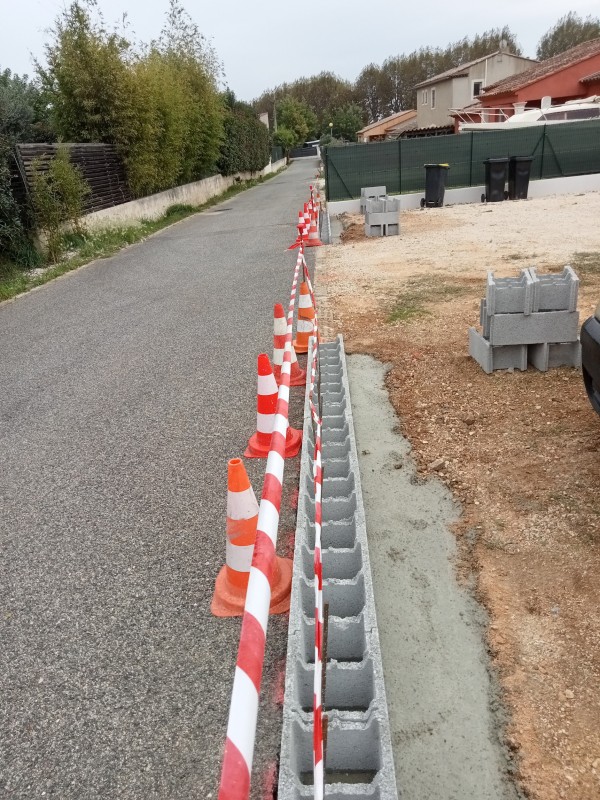 Création d'un mur de clôture et pose d'un portail 